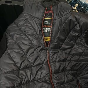 Hawke & Co hooded puffer jacket with knit sleeves and red zippers